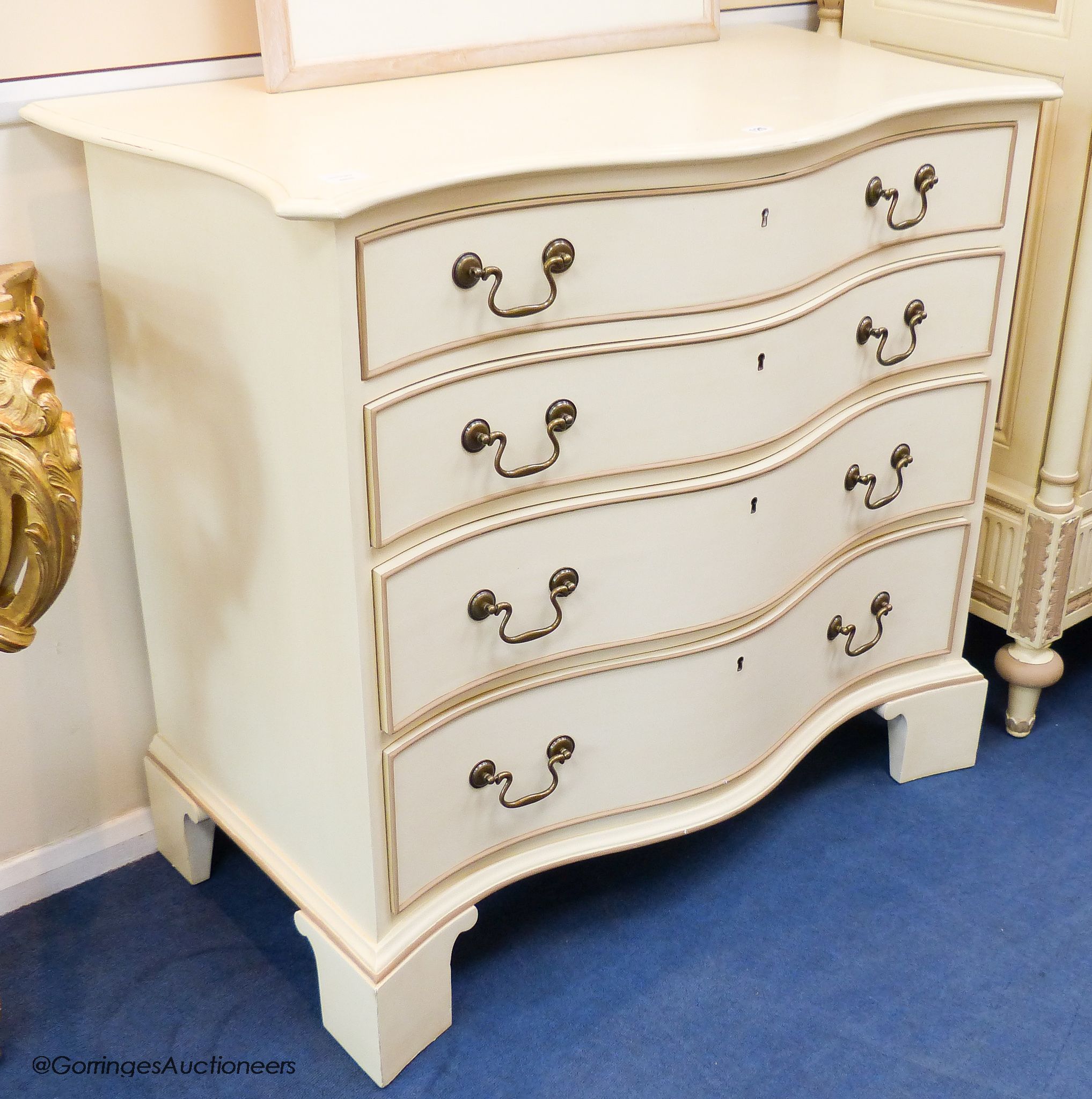 A cream and parcel gilt 'eclectic' chest of drawers by And So To Bed, 106 cm wide, 56 cm deep, 96.5 cm high